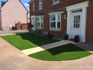 Newly fitted lawn from another angle at Cullompton properties