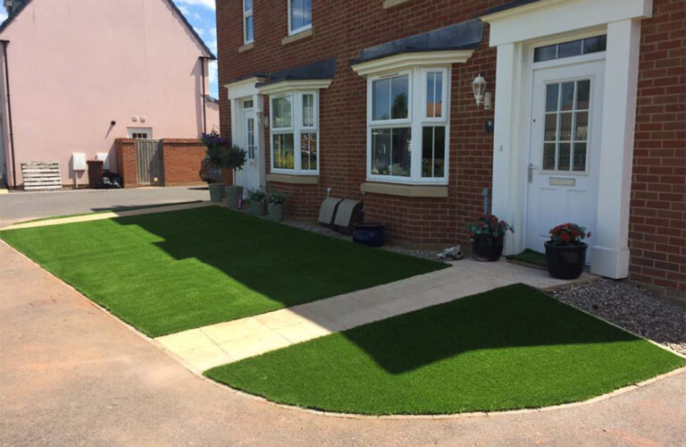 Newly fitted lawn from another angle at Cullompton properties