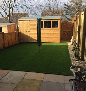 Residential home with artificial grass by Alpyne Grass, Exmouth, East Devon