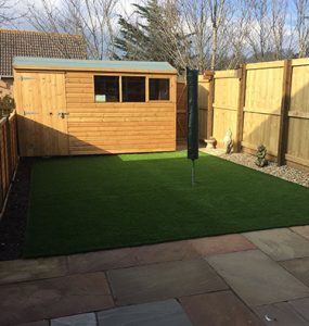 Home lawn with artificial turf, Exmouth, East Devon