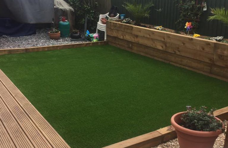 Our premium grass in place, creating brand-new garden party area