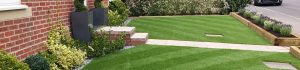 Front garden with artificial grass Exeter by Alpyne Grass