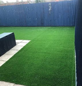 Exeter back garden with artificial grass area by Alpyne Grass