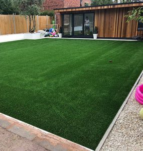 Large family-friendly artificial lawn in Exeter by Alpyne Grass