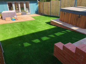 Artificial grass for a sloping garden in Exmouth